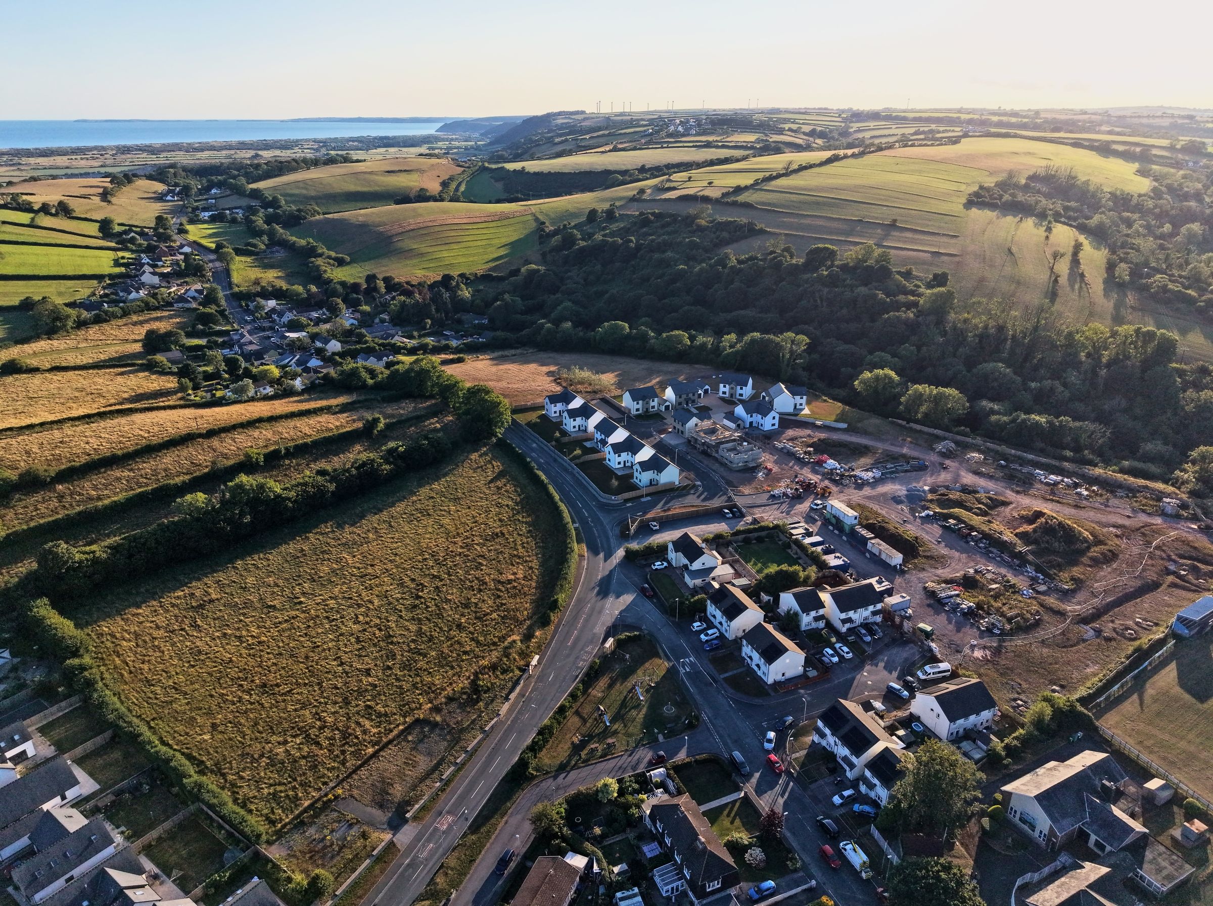 Cl&ocirc;s Hugdon, Laugharne &mdash; the curve of the development road through the homes