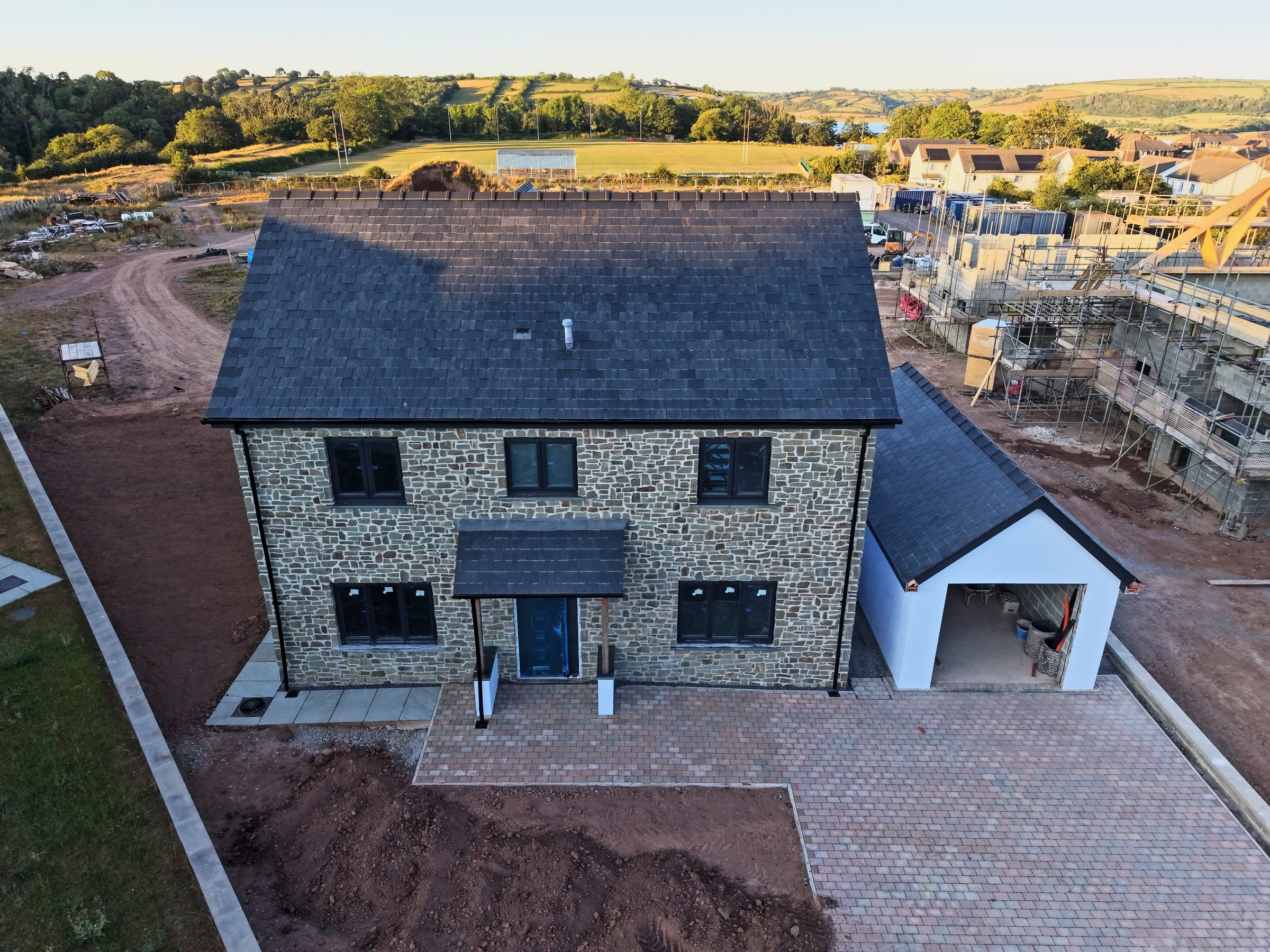 Cl&ocirc;s Hugdon, Laugharne &mdash; a finished detached home with a natural stone frontage