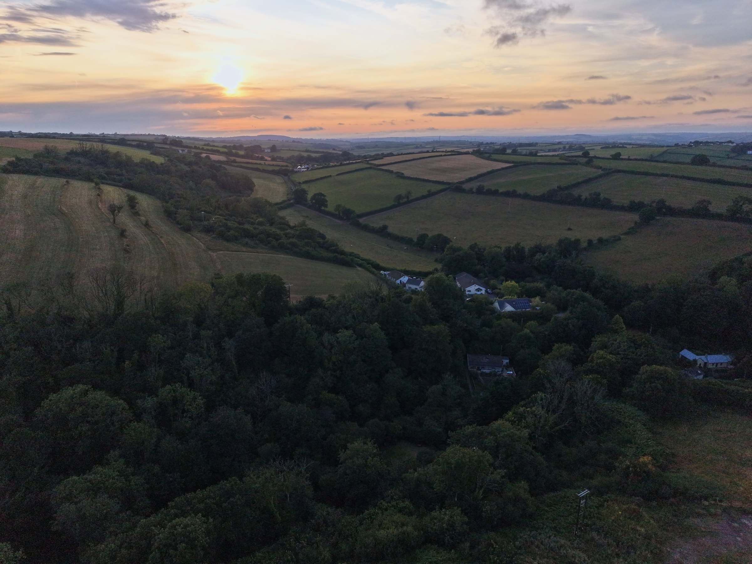Sunset over the sea at Laugharne, seen from above Cl&ocirc;s Hugdon